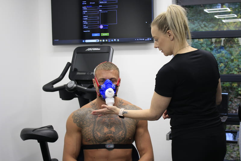 A customer running on a treadmill during a vo2 max test